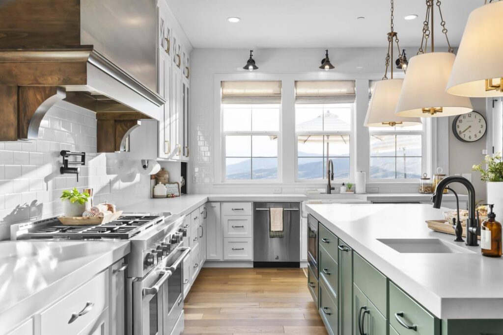 A stylish kitchen with white cabinetry and striking green countertops for enhanced aesthetics